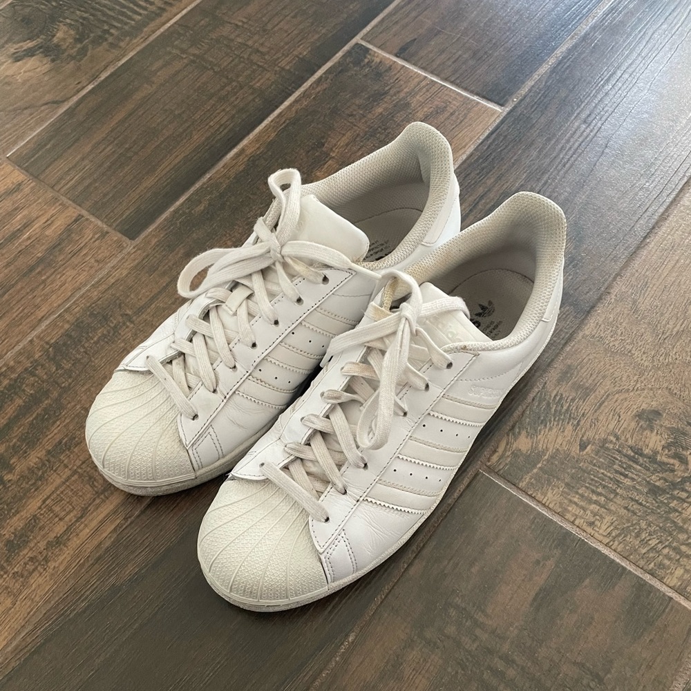 White Adidas Superstars